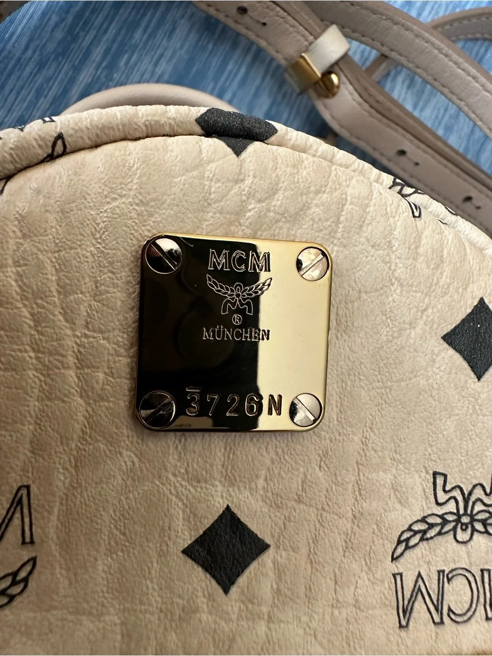 MCM Beige Visetos Mini Backpack with Gold Stud Accents